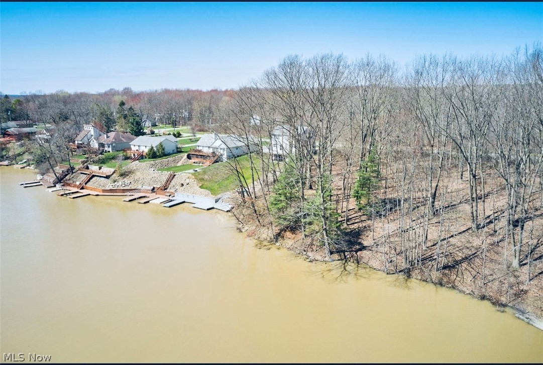 Callender Road Rock Creek, OH 44084 - Photo 8 of 15 Aerial view featuring a water view and a wooded view