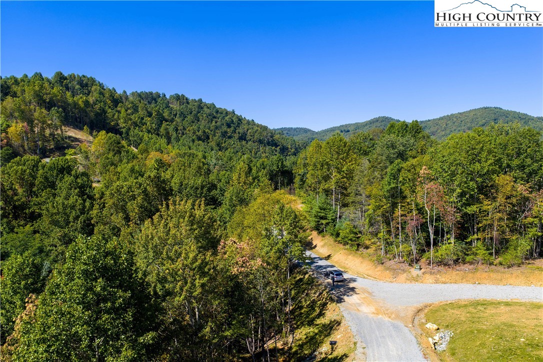 Lot 137 Angelfire Trail Deep Gap, NC 28618 - Photo 25 of 27 a view of a yard with a street