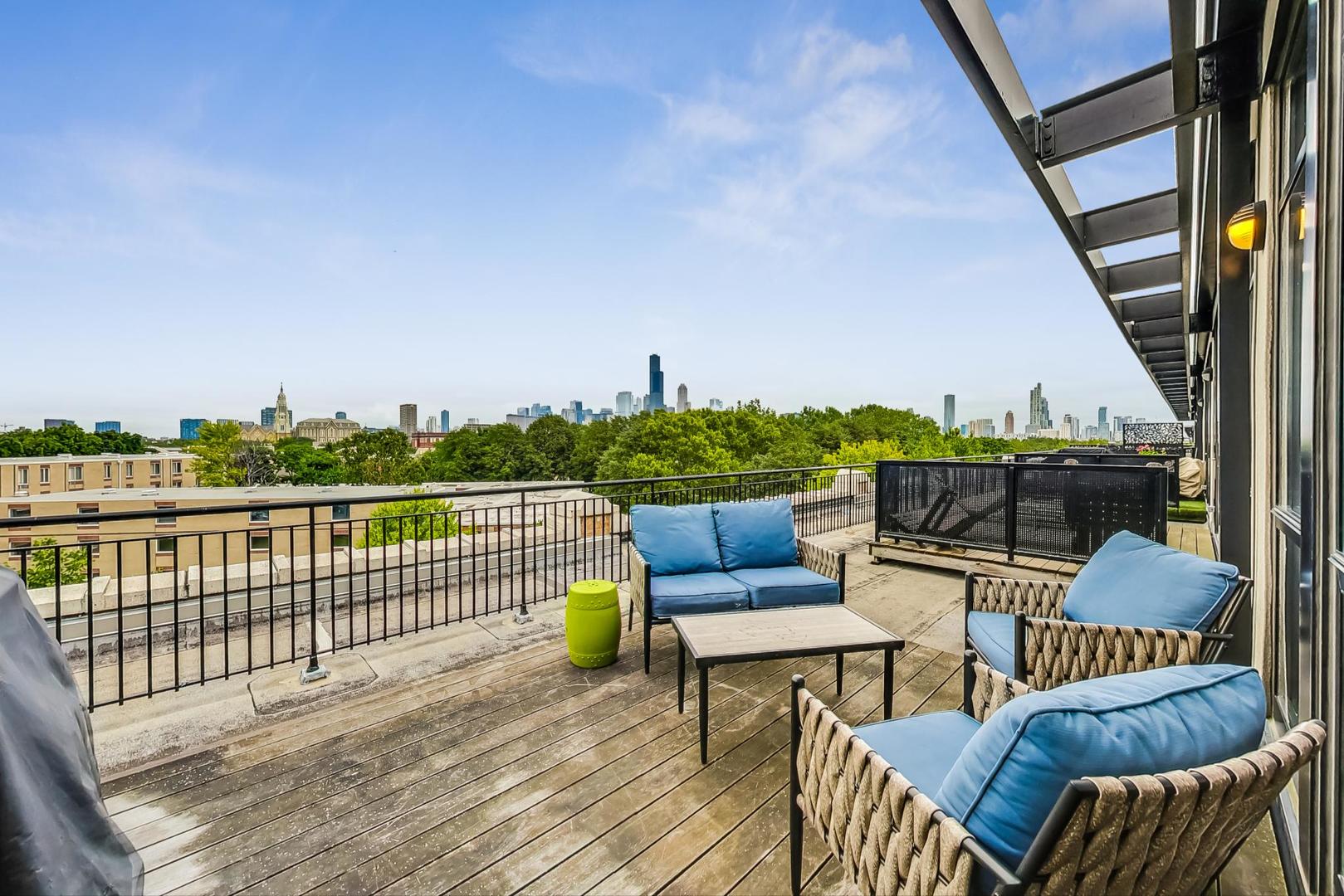 1111 West 14th Place, Unit 328 Chicago, IL 60608 - Photo 42 of 49 a view of a balcony with furniture