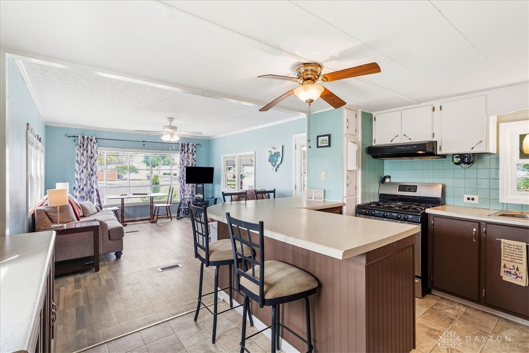 246 North Orchard Island Road Russells Point, OH 43348 - Photo 14 of 43 This inviting home offers an open-concept living area and kitchen, perfect for comfortable living.