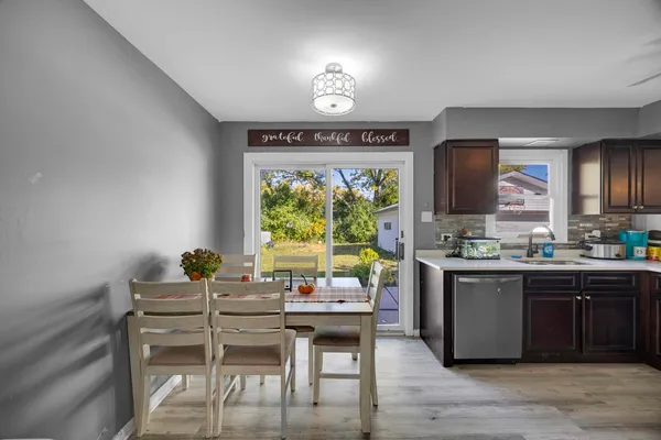 a kitchen with a stove and a refrigerator