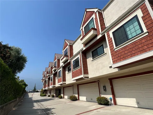 a view of a building with a street