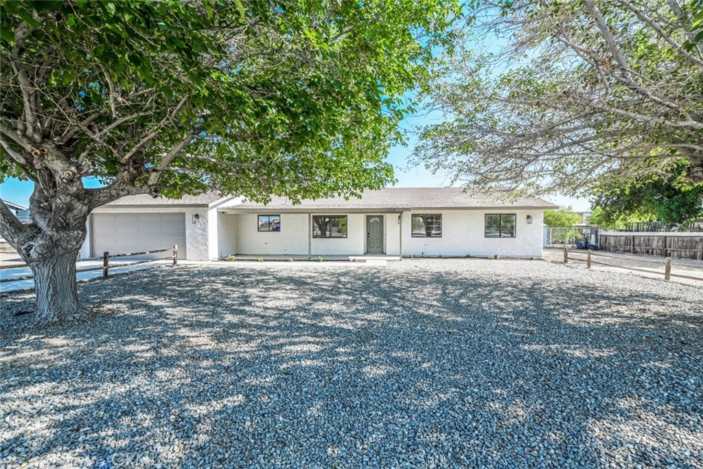 21110 Klamath Road Apple Valley, CA 92308 - Photo 1 of 1 front view of a house with a tree