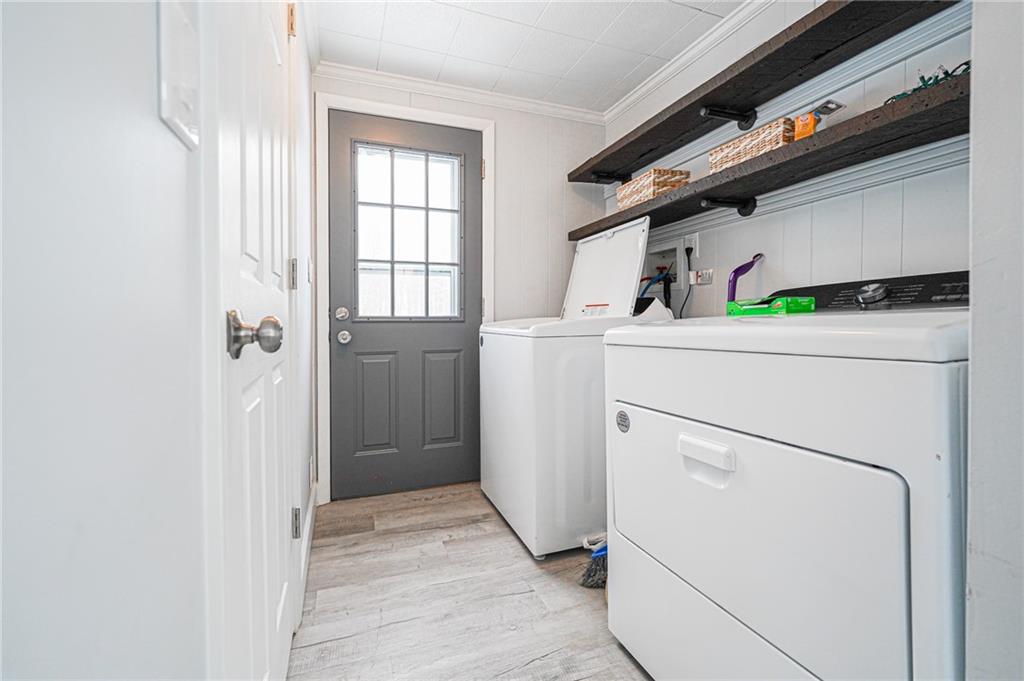 671 Old Rte 8 Harrisville, PA 16038 - Photo 26 of 49 a utility room with dryer and washer