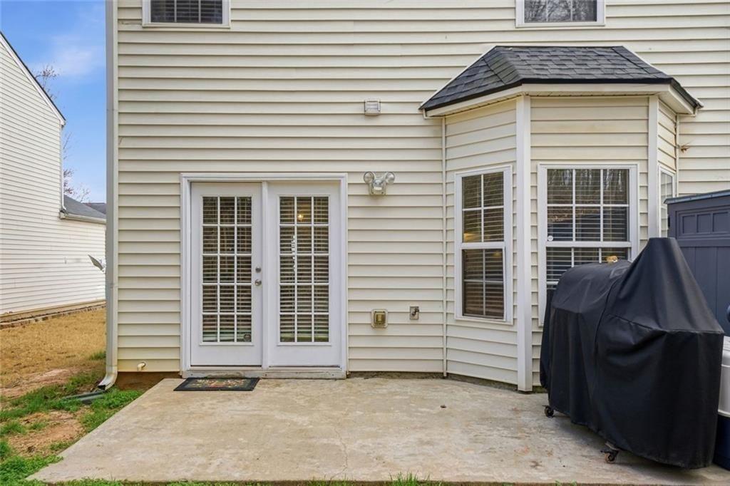 148 Timber Gate Drive Lawrenceville, GA 30045 - Photo 33 of 38 a front view of a house with a garage