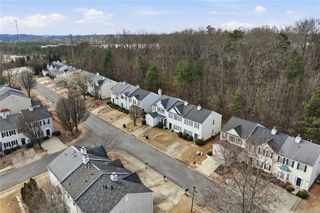 148 Timber Gate Drive Lawrenceville, GA 30045 - Photo 36 of 38 a view of a lake with houses