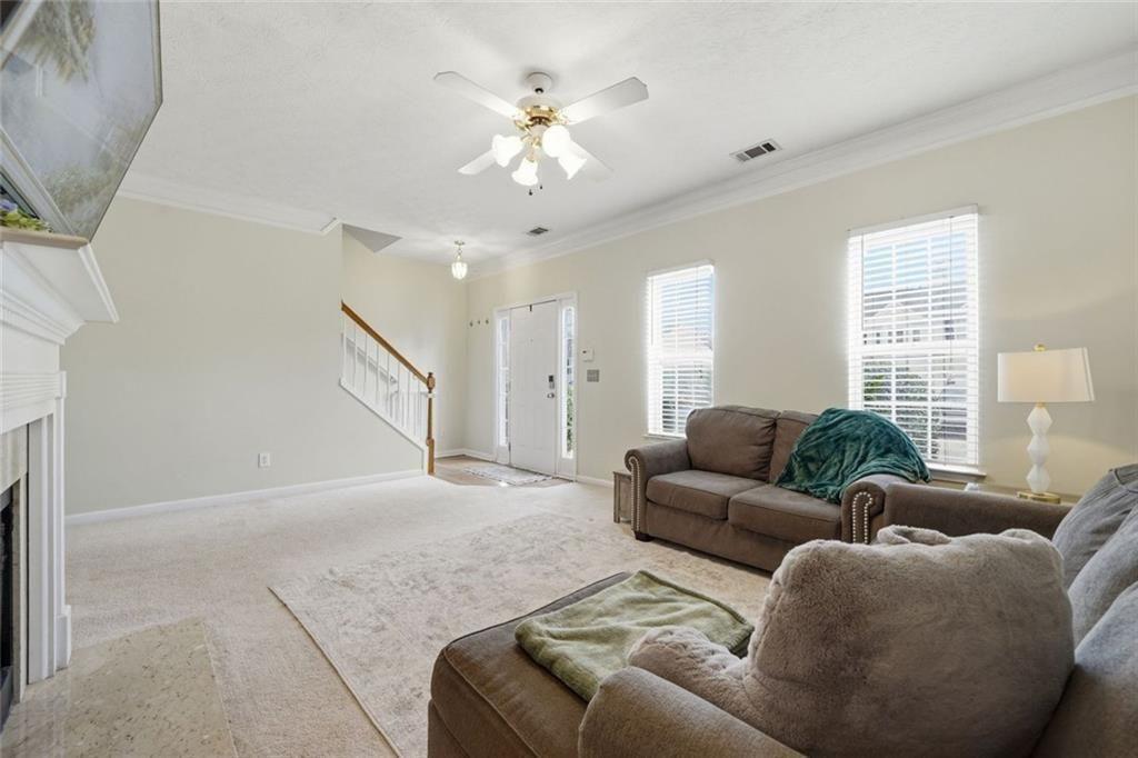 148 Timber Gate Drive Lawrenceville, GA 30045 - Photo 4 of 38 a living room with furniture and a large window