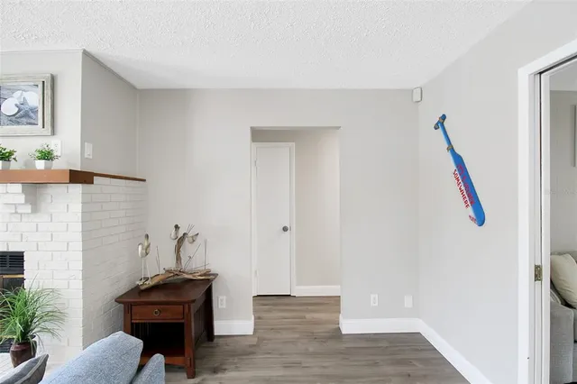 a view of a livingroom with furniture and wooden floor