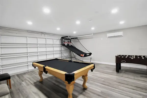 a room with furniture and wooden floor