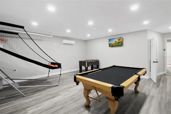 a room with furniture and wooden floor