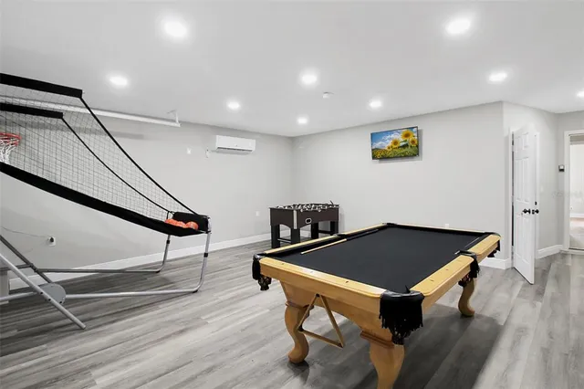 a room with furniture and wooden floor