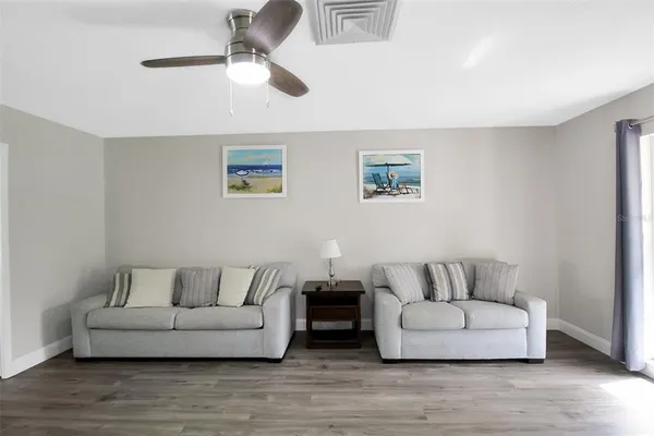 a living room with furniture and a couch