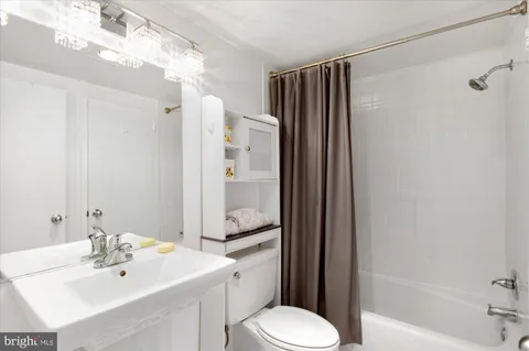 a view of a kitchen from the hallway