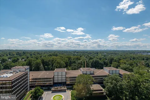 a view of a city with tall buildings