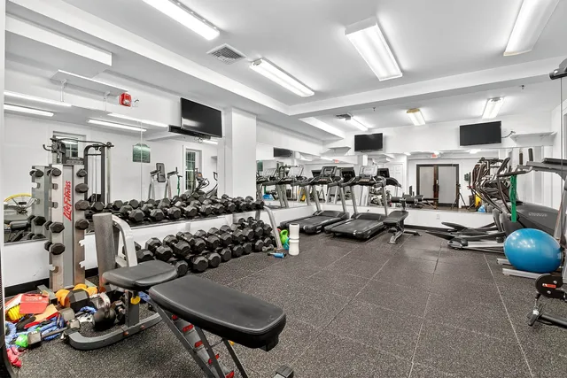 a view of a room with gym equipment