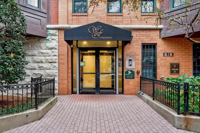 a front view of a house with a porch