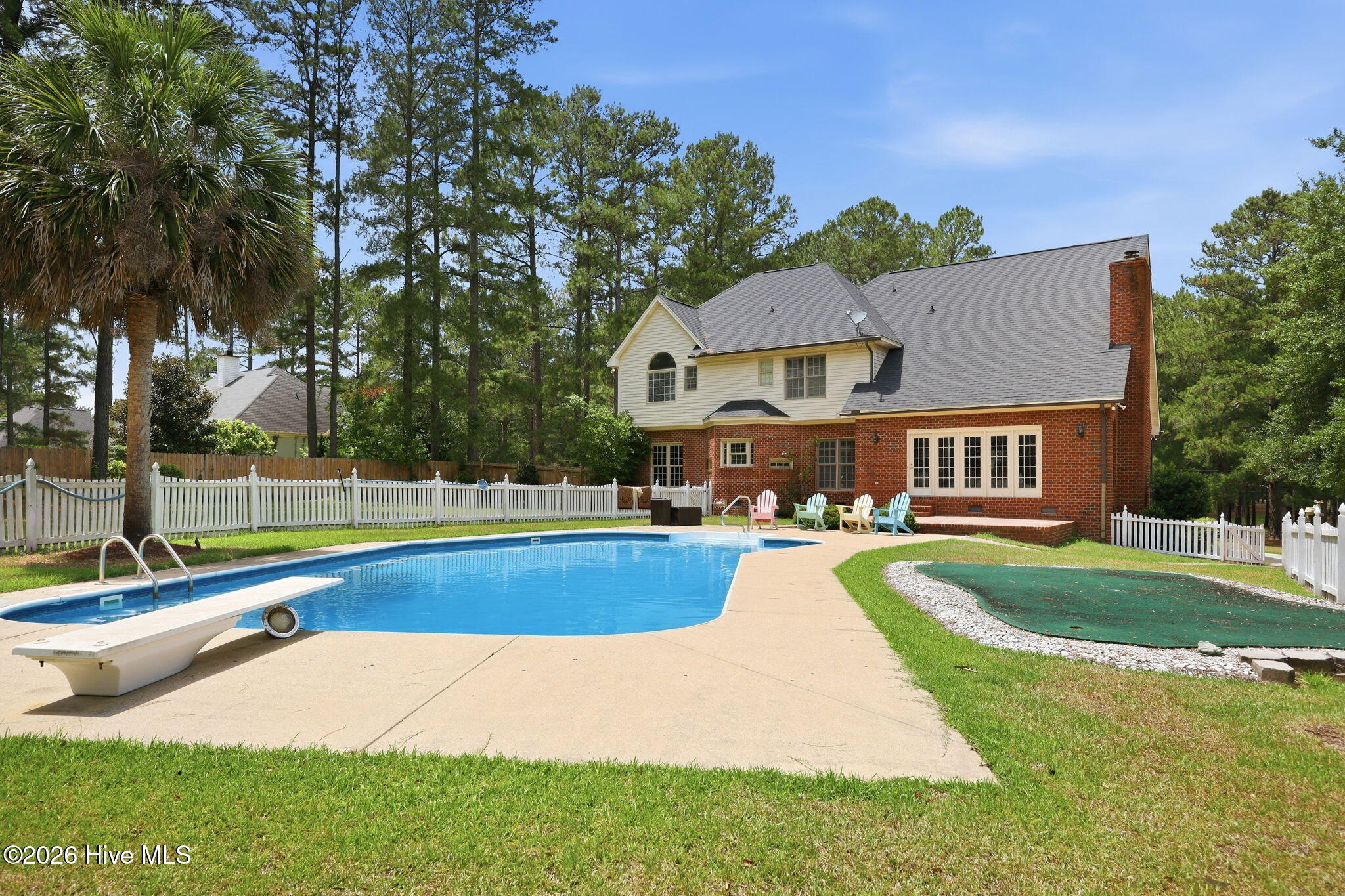 4076 Mobleys Bridge Road Grimesland, NC 27837 - Photo 53 of 66 pool and putting green