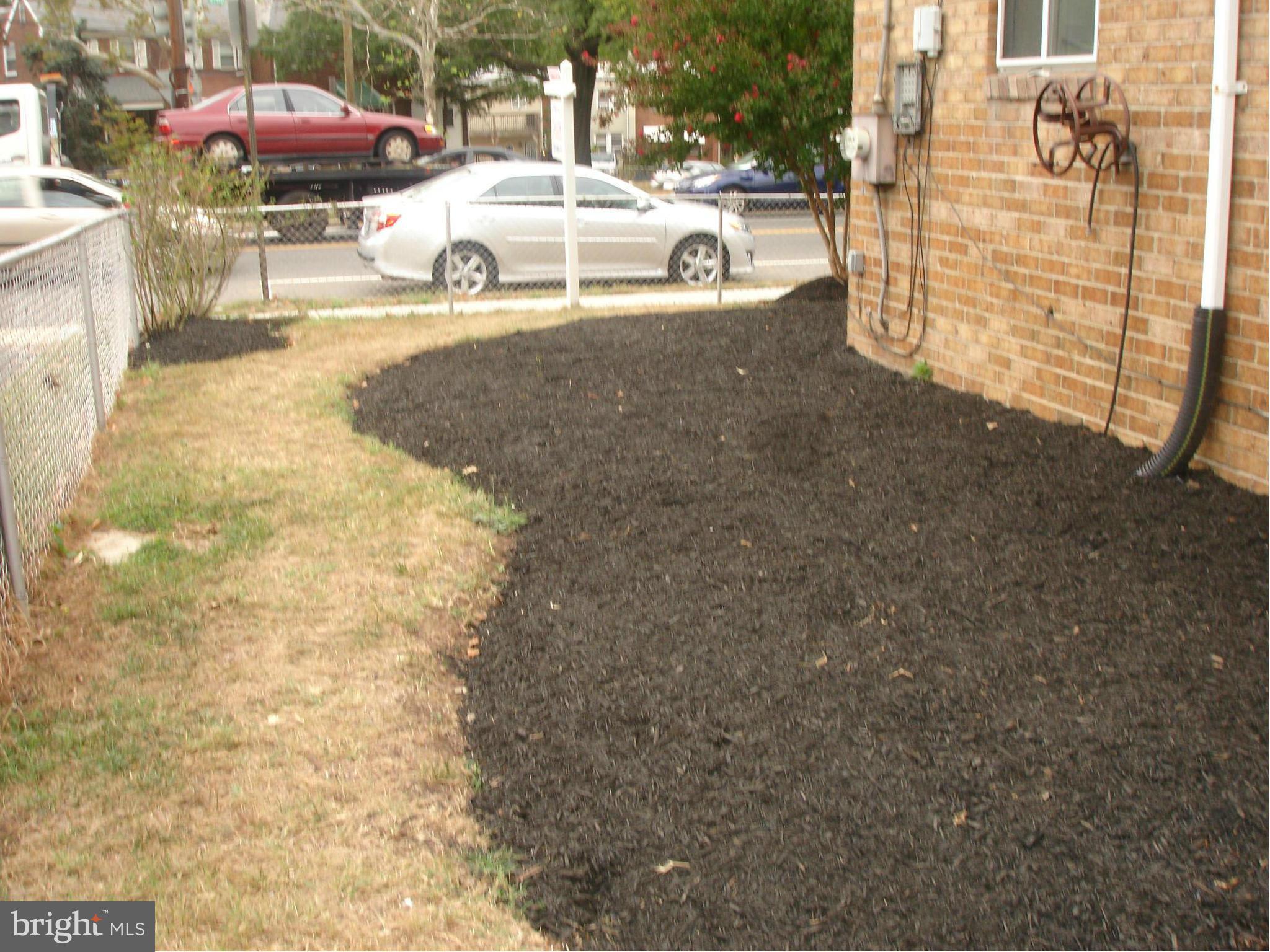 4705 Sargent Road Northeast Washington, DC 20017 - Photo 2 of 24 a view of a patio with a yard