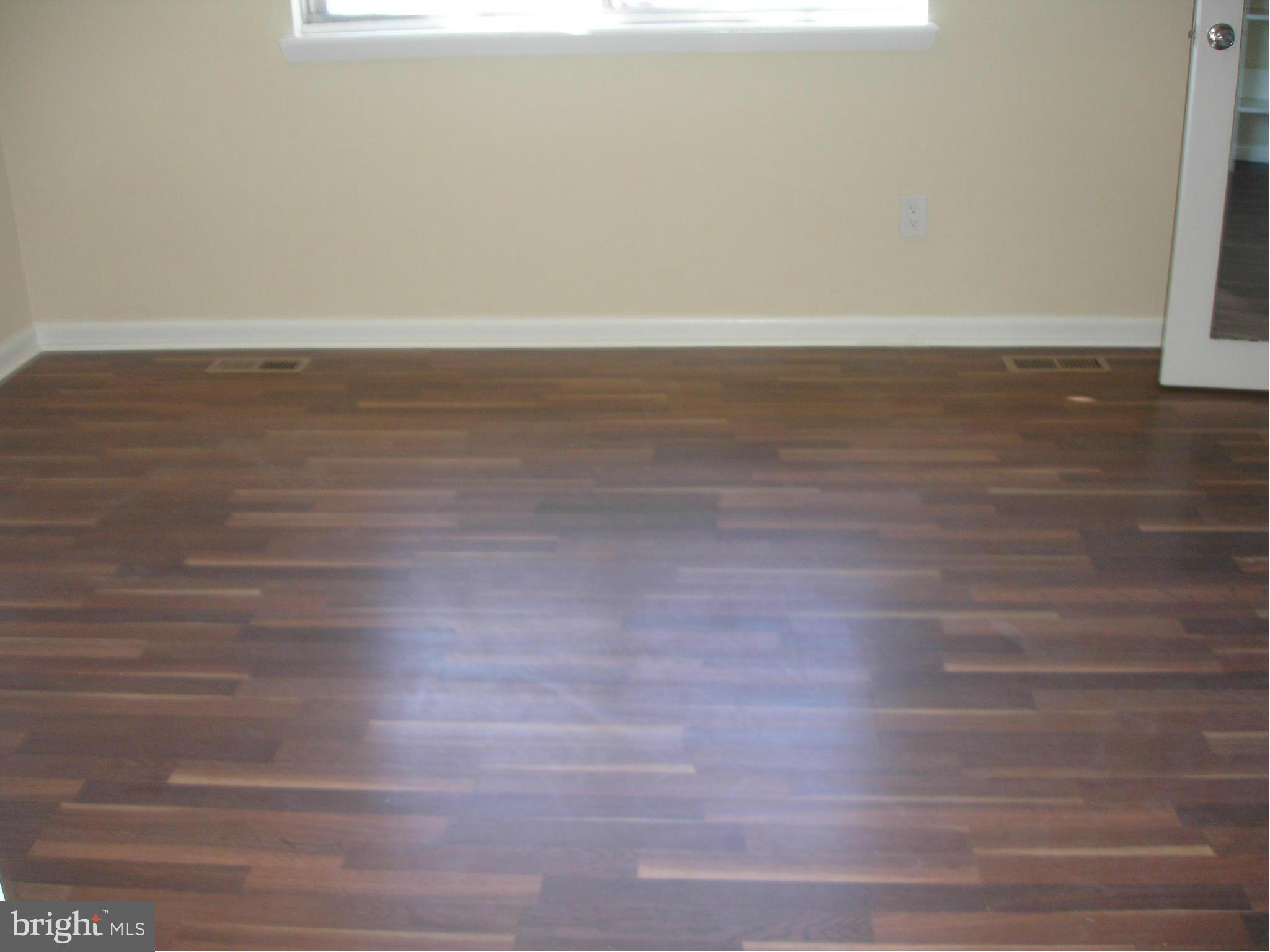 4705 Sargent Road Northeast Washington, DC 20017 - Photo 12 of 24 a view of a room with wooden floor