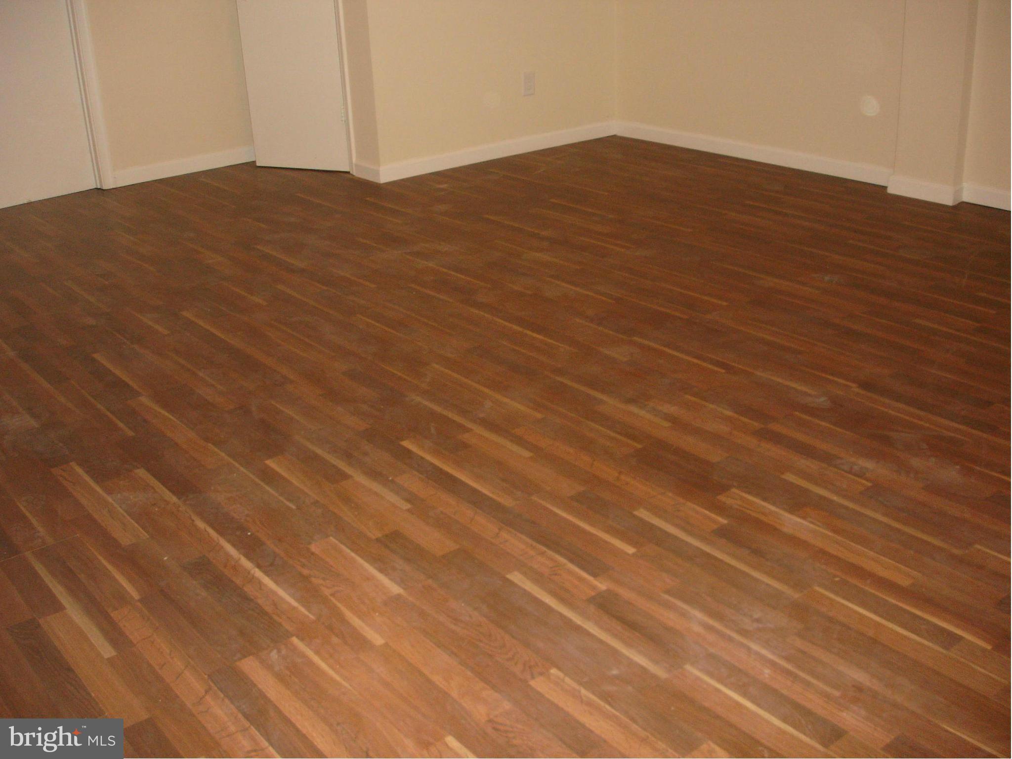 4705 Sargent Road Northeast Washington, DC 20017 - Photo 20 of 24 a view of empty room with wooden floor