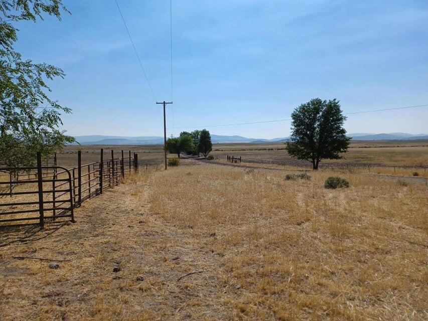 557-435 Center School House Road Bieber, CA 96009 - Photo 9 of 24 a view of a yard with wooden fence