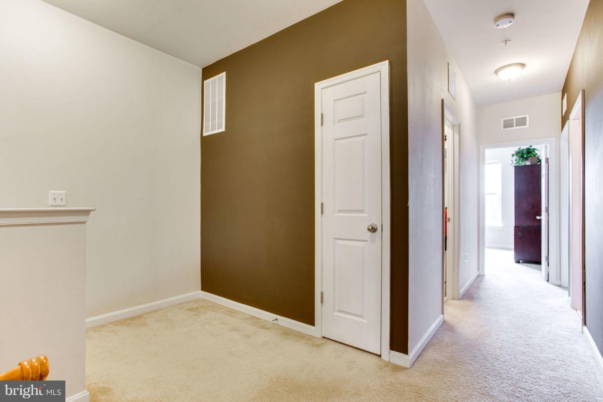 9535 Center Street Manassas, VA 20110 - Photo 14 of 26 Upper hall towards 2nd and 3rd bedrooms