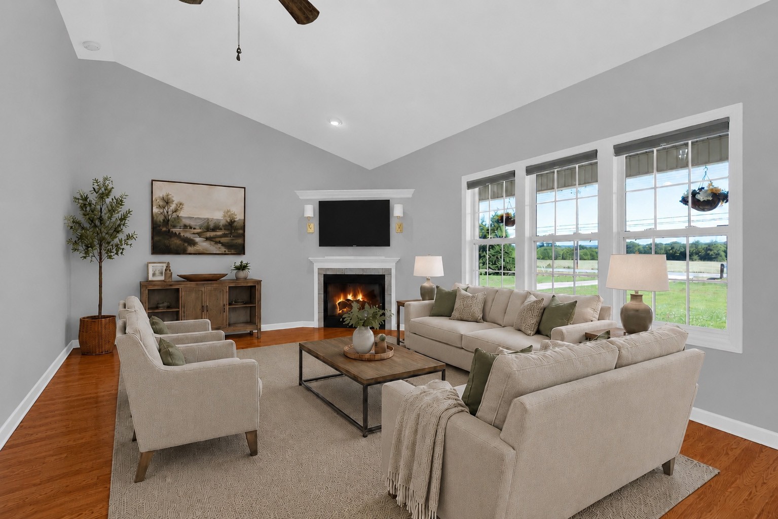 3896 Lynchburg Road Winchester, TN 37398 - Photo 6 of 57 a living room with furniture a large window and a fireplace