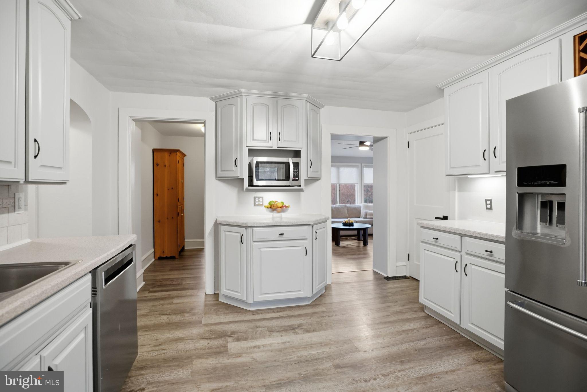330 Fairhill Road Hatfield, PA 19440 - Photo 13 of 49 a kitchen with white cabinets and stainless steel appliances