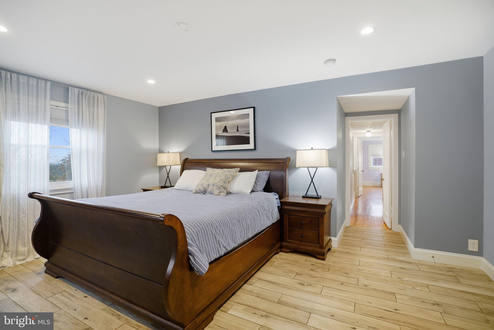 330 Fairhill Road Hatfield, PA 19440 - Photo 17 of 49 a bedroom with a bed and wooden floor