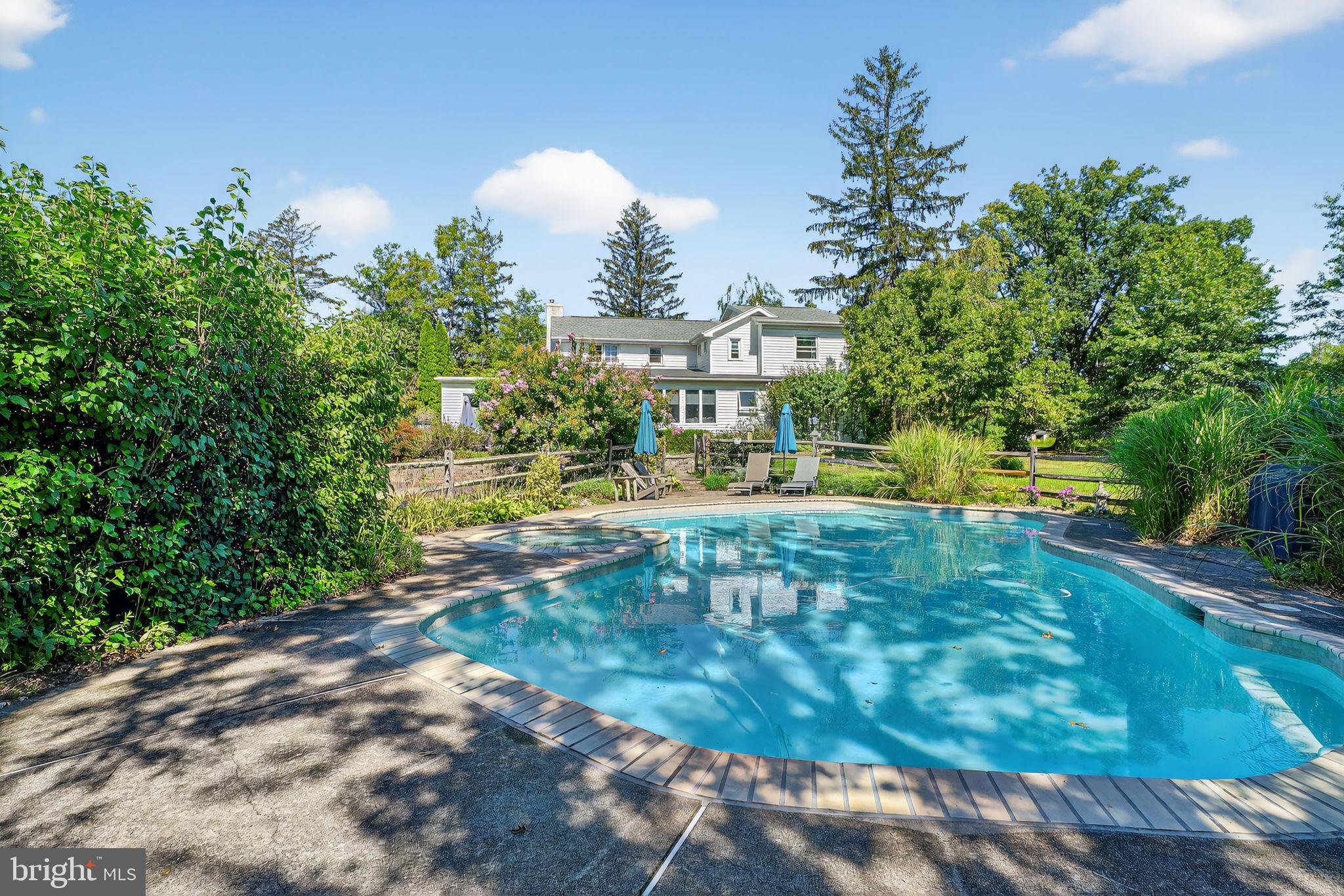 330 Fairhill Road Hatfield, PA 19440 - Photo 2 of 49 a view of yard with swimming pool and green space