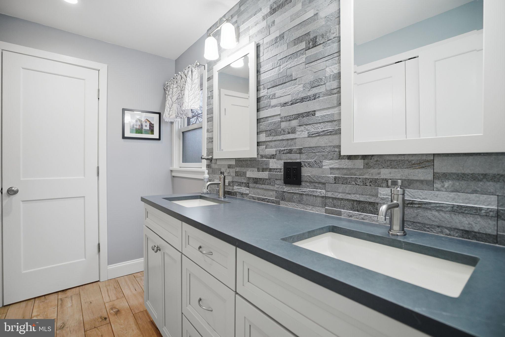 330 Fairhill Road Hatfield, PA 19440 - Photo 21 of 49 a kitchen with stainless steel appliances a sink and cabinets
