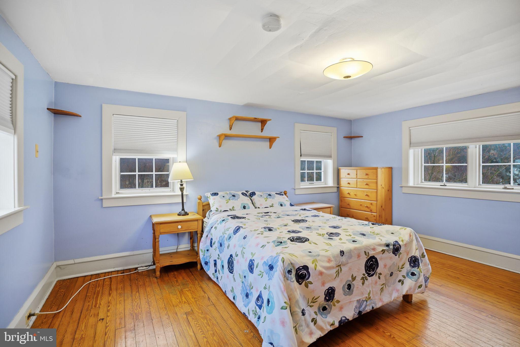 330 Fairhill Road Hatfield, PA 19440 - Photo 23 of 49 a bedroom with a bed and wooden floor