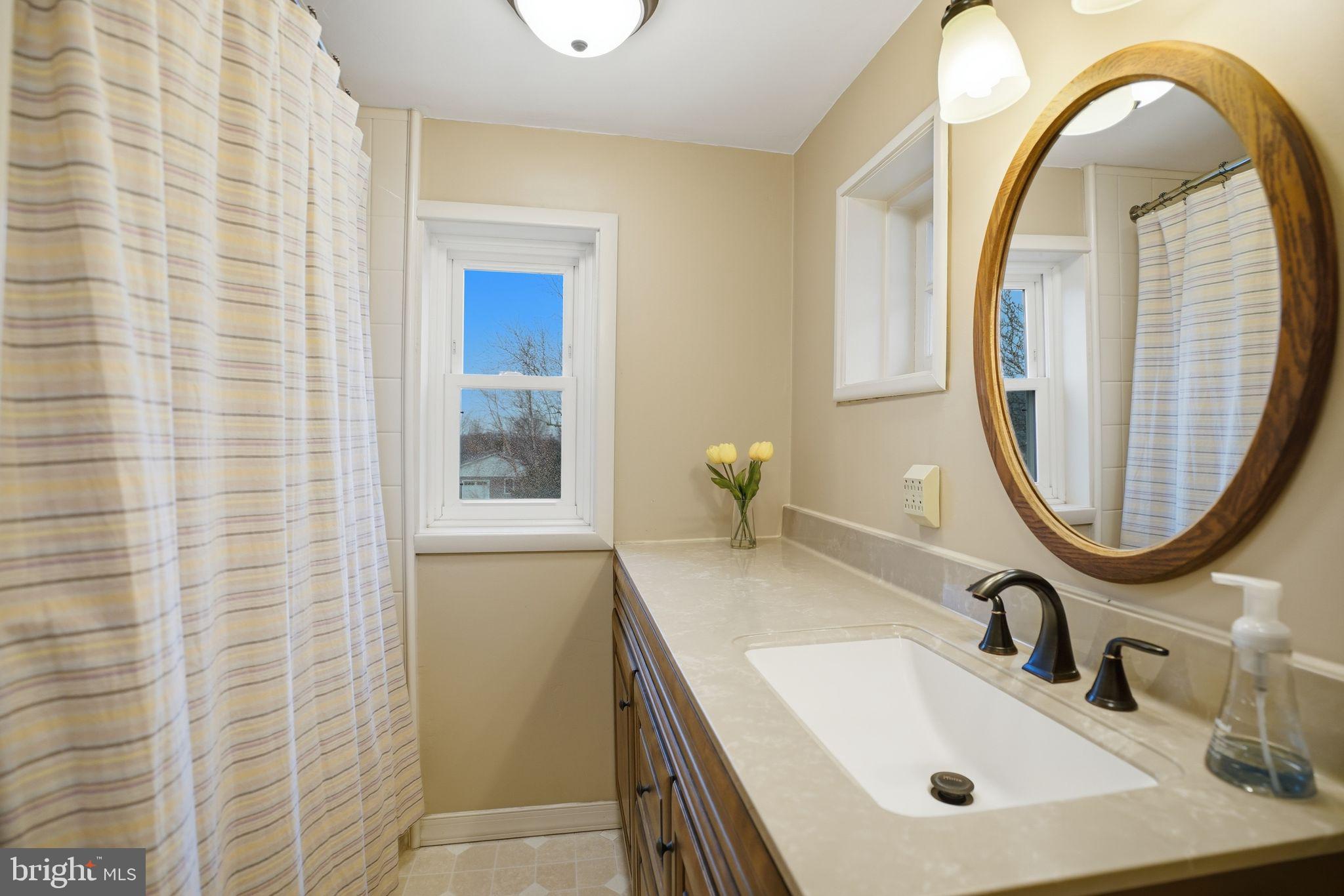 330 Fairhill Road Hatfield, PA 19440 - Photo 25 of 49 a bathroom with a sink and a mirror