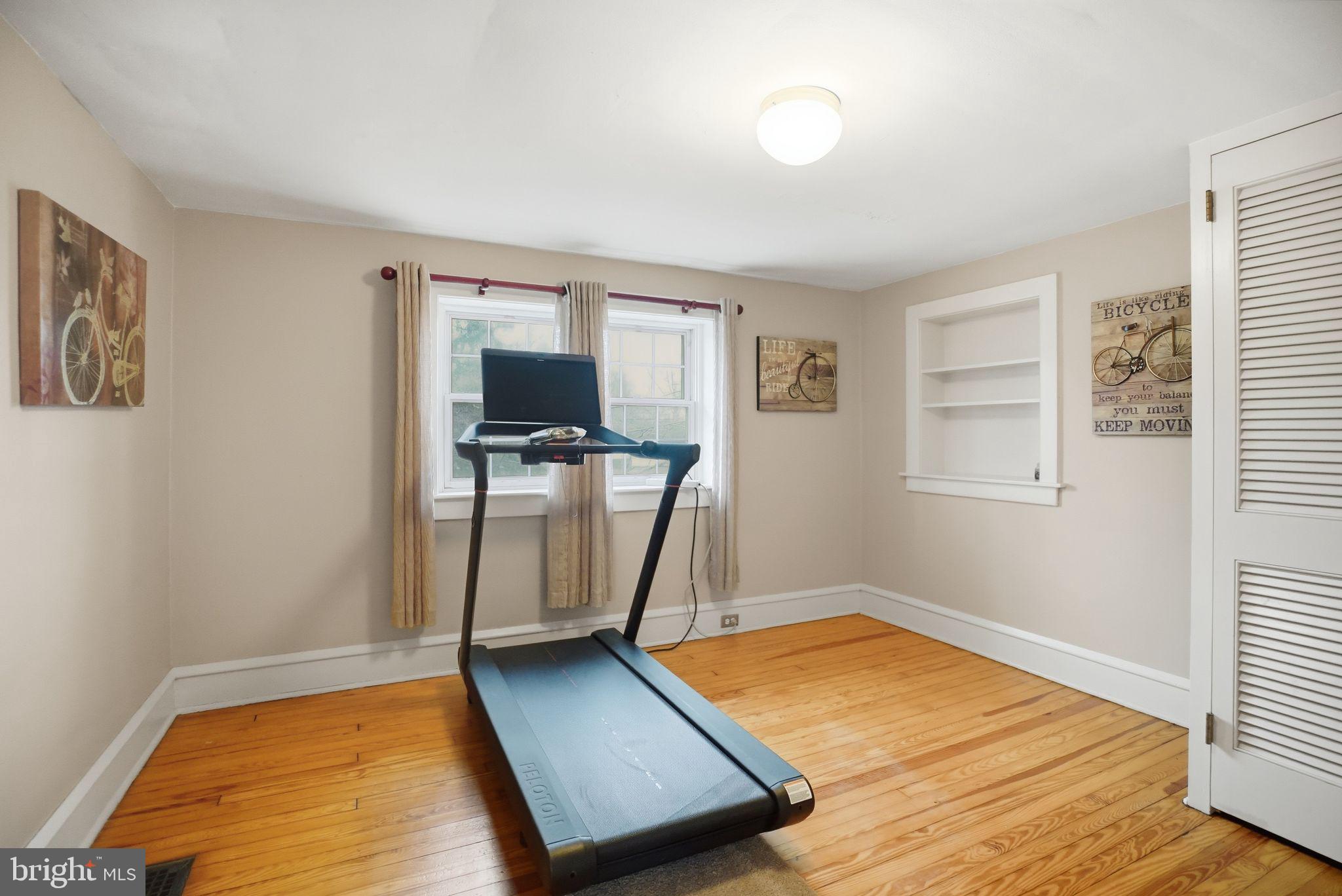 330 Fairhill Road Hatfield, PA 19440 - Photo 26 of 49 a room with wooden floor and chair