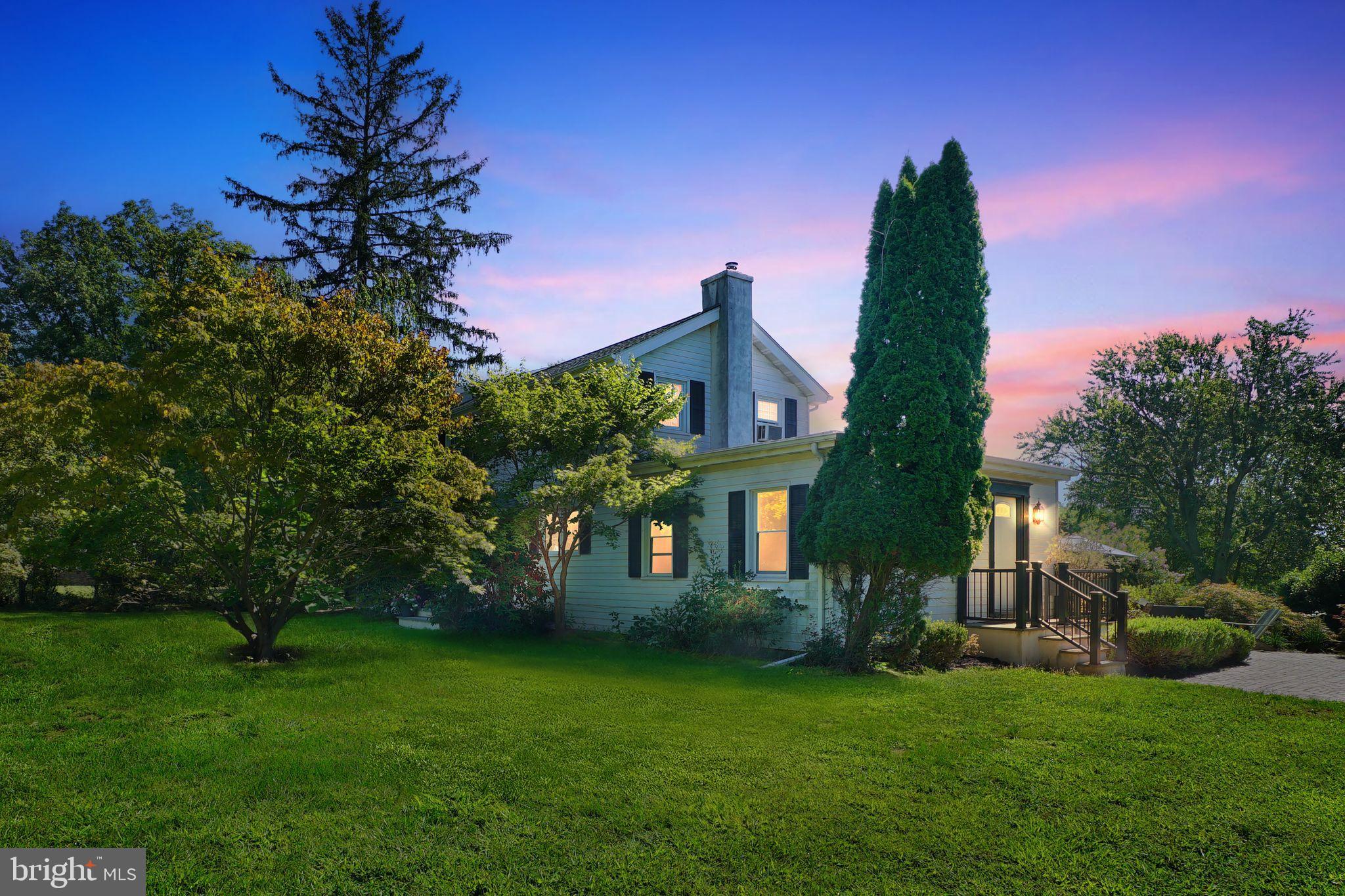330 Fairhill Road Hatfield, PA 19440 - Photo 4 of 49 a front view of a house with a garden