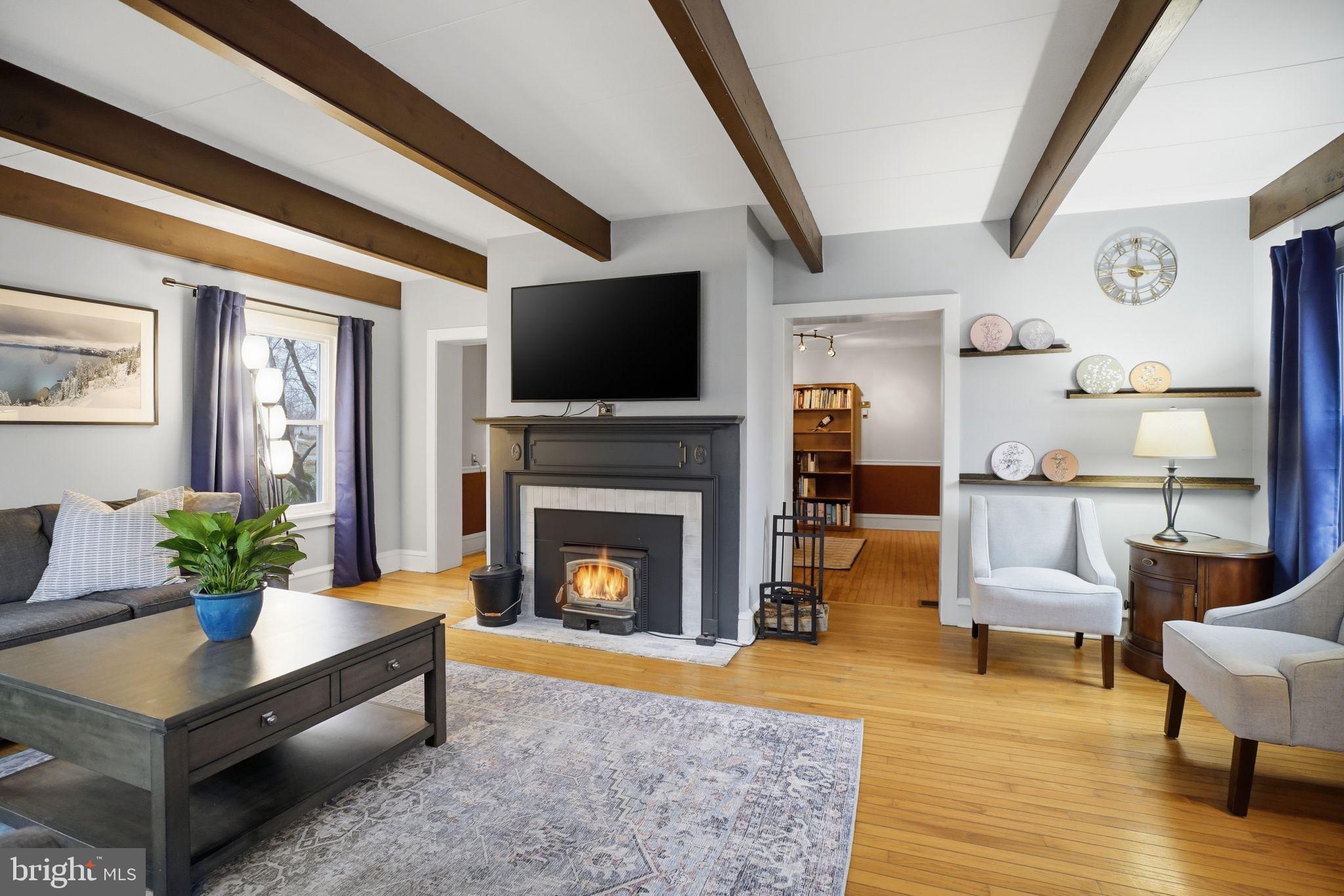 330 Fairhill Road Hatfield, PA 19440 - Photo 7 of 49 a living room with furniture flat screen tv and a fireplace