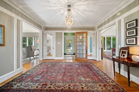 a kitchen with stainless steel appliances granite countertop a stove and a wooden cabinets