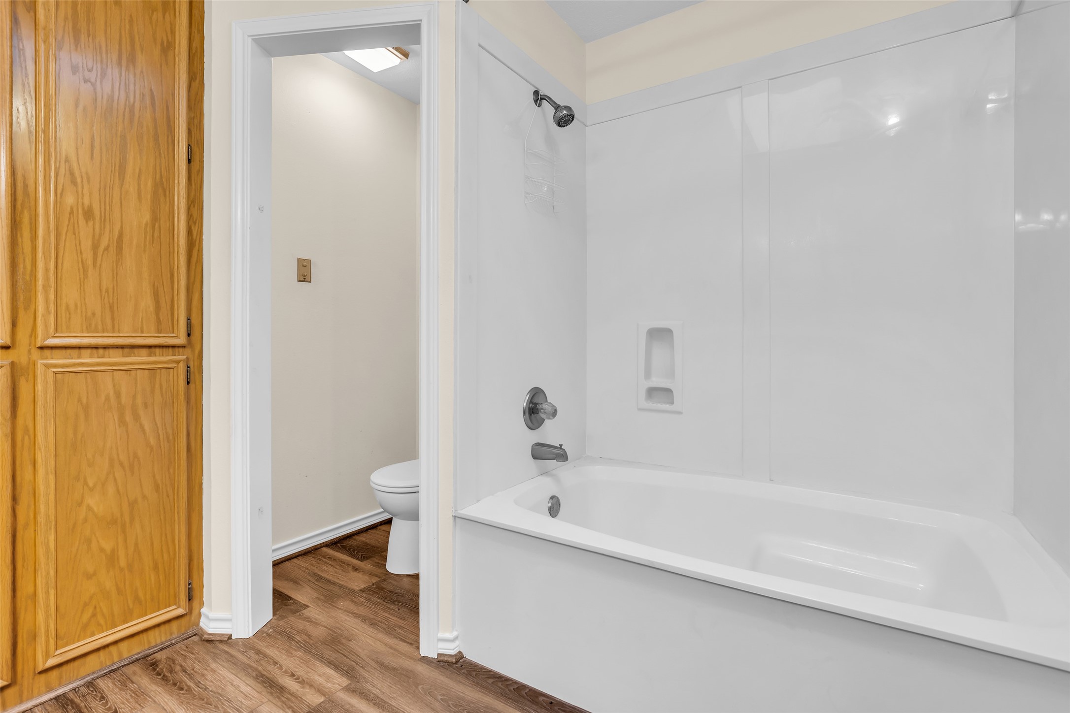 7 Lazy Spring Trinity, TX 75862 - Photo 17 of 25 Primary bathroom featuring a luxurious soaking tub w/shower