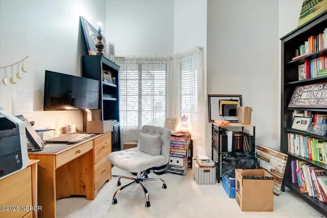 a bedroom with a bed and a dressers