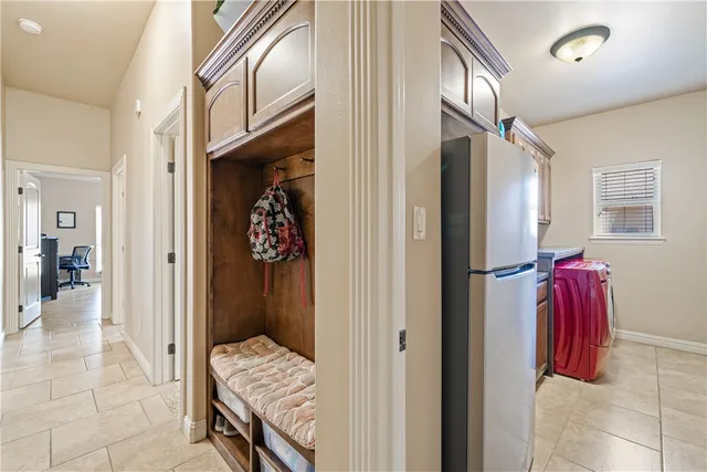 a bedroom with a bed and a cabinets