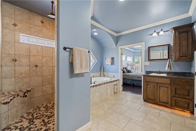 a view of a livingroom with furniture and staircase