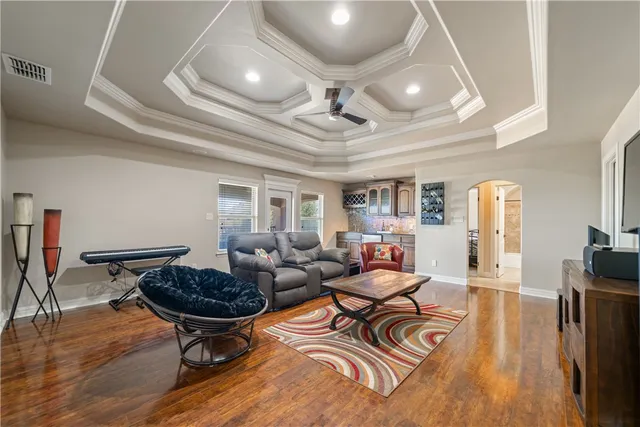 a kitchen with granite countertop a sink and cabinets
