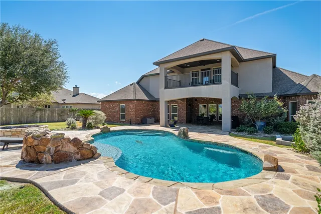 a outdoor space with patio the couches and a dining table with garden view