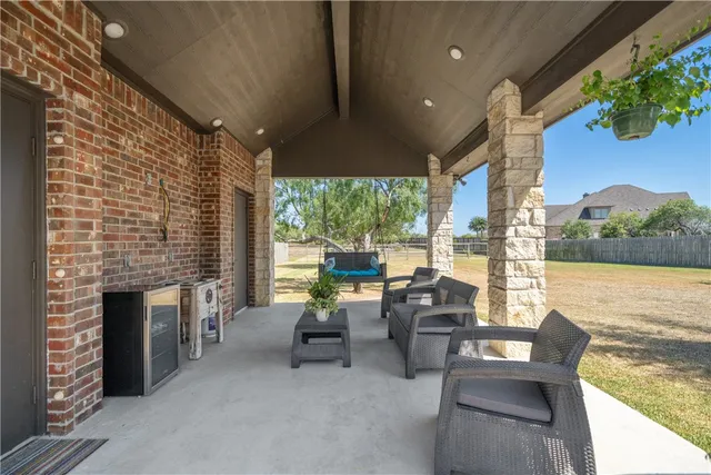 a view of a swimming pool and a yard