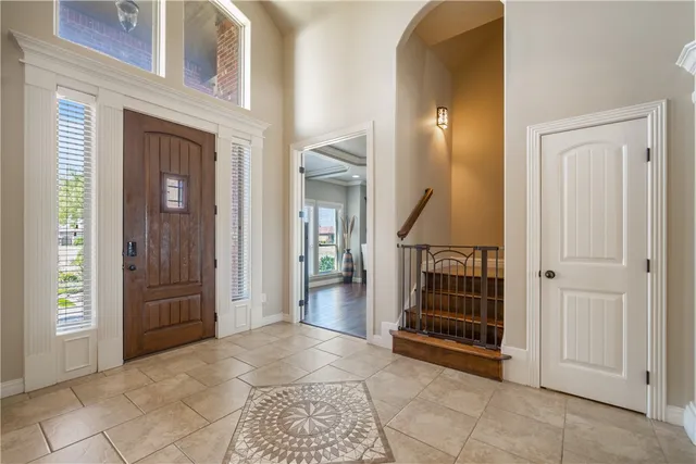 an empty room with wooden floor and furniture