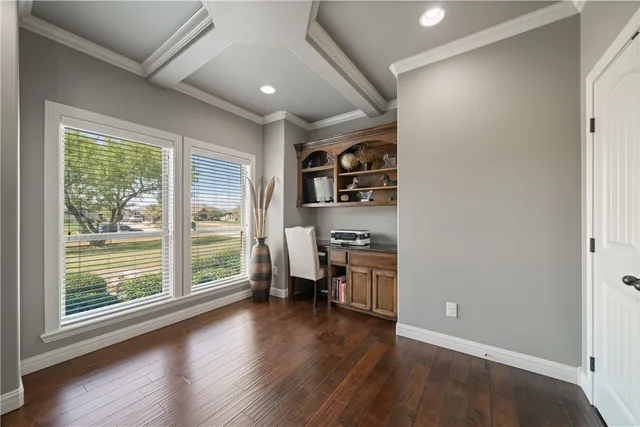 a living room with furniture a chandelier a rug and a window