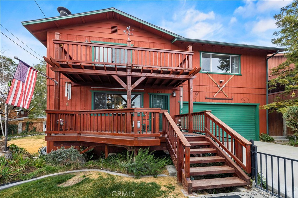 921 Piru Way Frazier Park, CA 93225 - Photo 2 of 62 a view of a house with wooden deck front of house