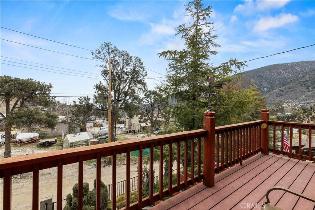 921 Piru Way Frazier Park, CA 93225 - Photo 31 of 62 a view of a balcony with wooden floor