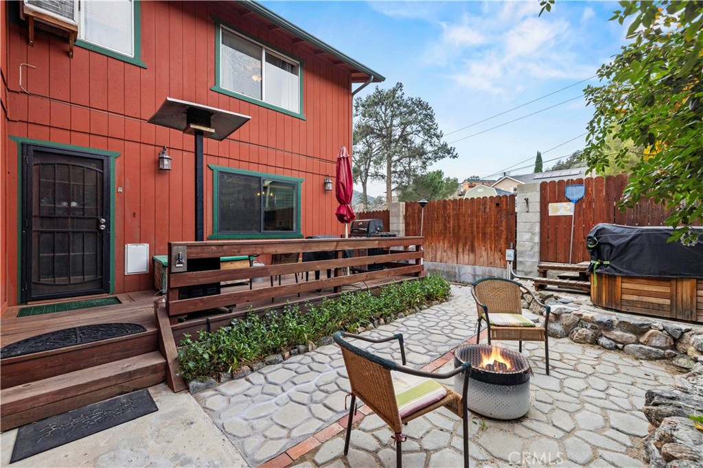 921 Piru Way Frazier Park, CA 93225 - Photo 39 of 62 a view of a chairs and tables in the back yard of the house