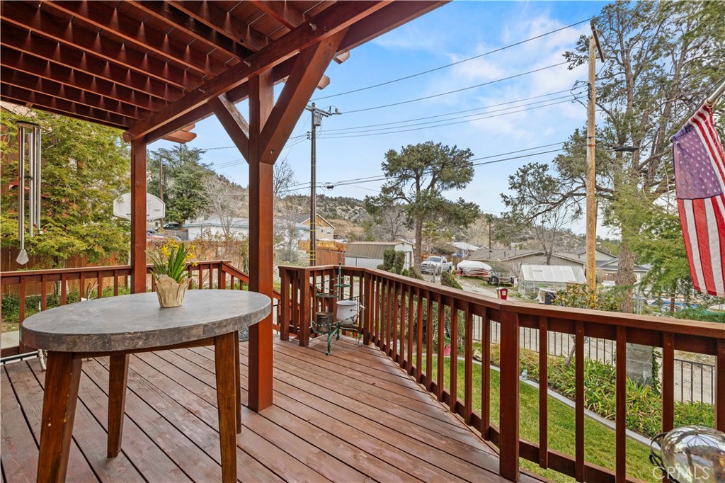 921 Piru Way Frazier Park, CA 93225 - Photo 4 of 62 a view of a balcony with table and chairs